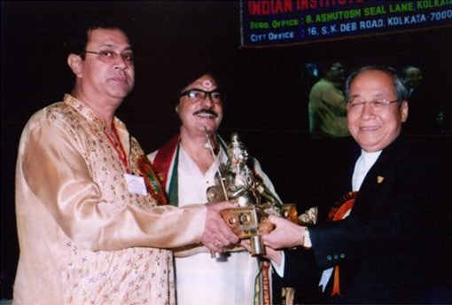 Prof. Shyamal Bhattacharya along with Dr. Ramkrishna Sastri, Felicitates Shri R. S. Mooshahari, Hon'ble Governor of Meghalaya.