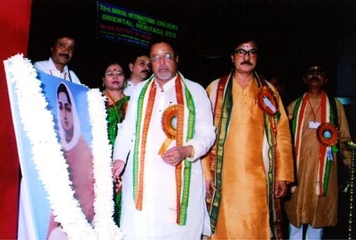 Shri Mukul Roy, Garlanding the portrait of Ma Sarodamoni.